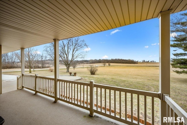 exterior space featuring a yard and a rural view