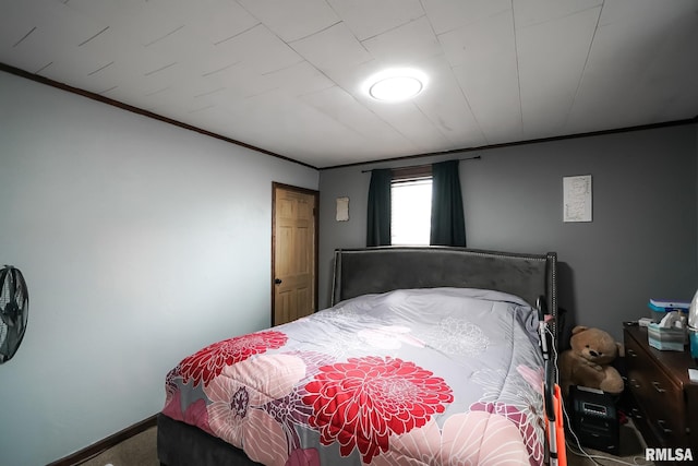 bedroom with crown molding