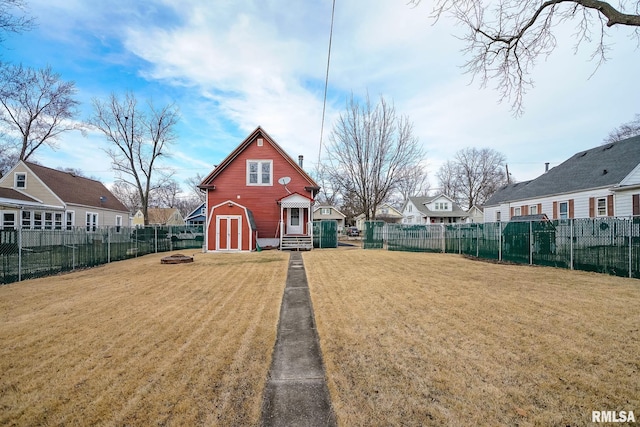 view of outbuilding featuring a yard