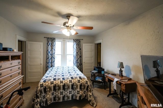 bedroom featuring carpet flooring and ceiling fan