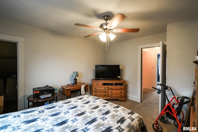 bedroom with ceiling fan and light colored carpet