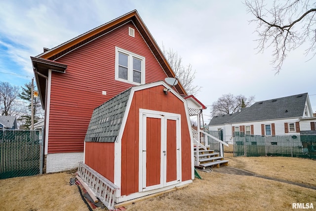 view of outdoor structure featuring a yard