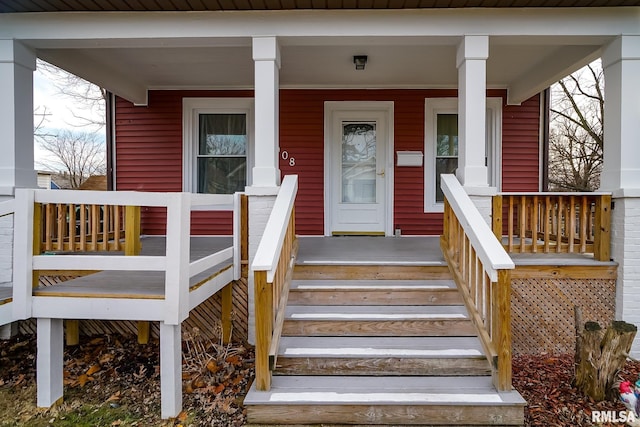 property entrance with a porch