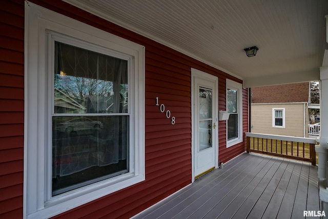 wooden terrace with covered porch