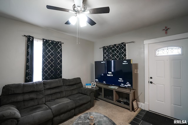 living room featuring ceiling fan