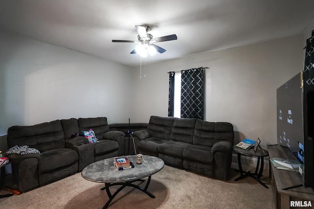 carpeted living room featuring ceiling fan