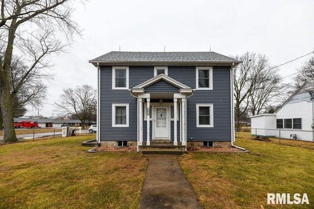 view of front of home with a front yard