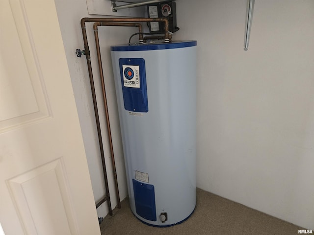 utility room with electric water heater