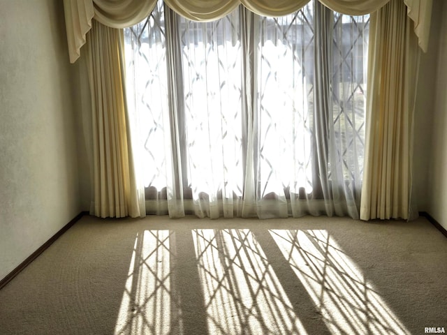 view of carpeted spare room