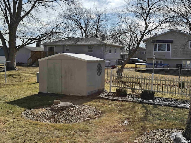 view of outbuilding featuring a lawn