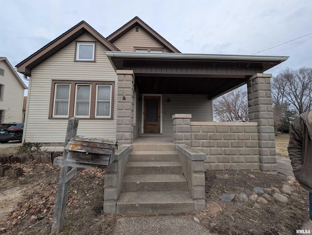 view of front of home featuring covered porch