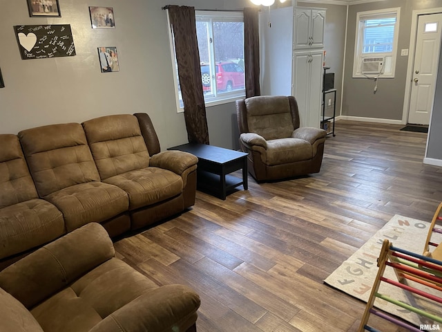 living room featuring cooling unit and hardwood / wood-style flooring