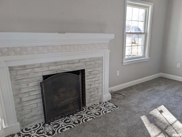 interior details with a fireplace and carpet floors