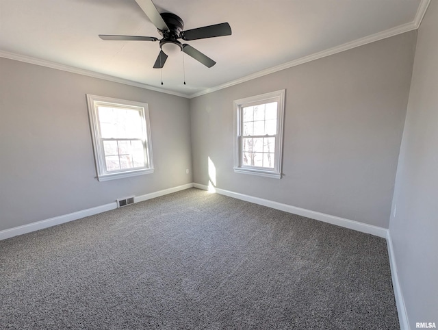 unfurnished room featuring ornamental molding, ceiling fan, and carpet