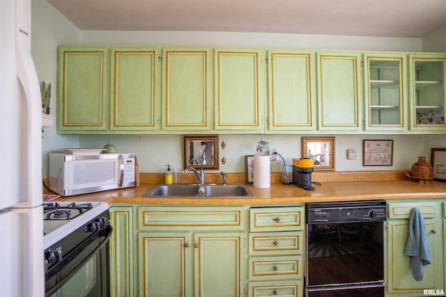 kitchen with sink and white appliances