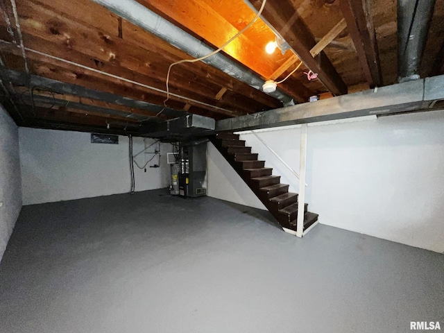 basement featuring heating unit