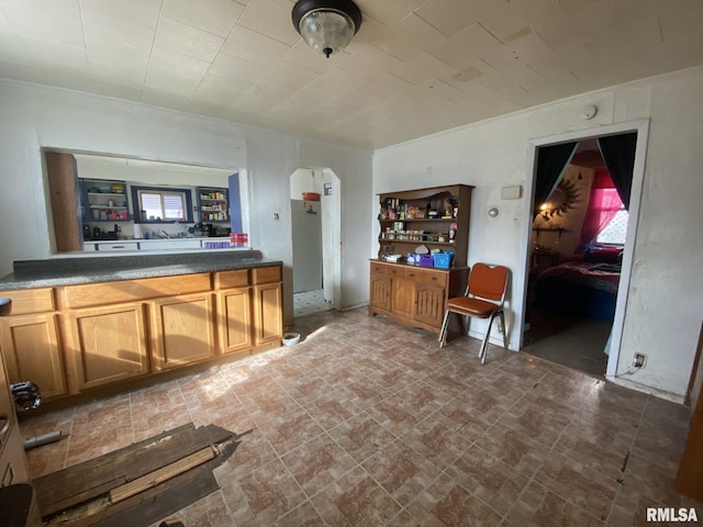 kitchen featuring crown molding