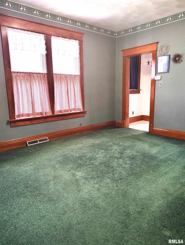 view of carpeted spare room