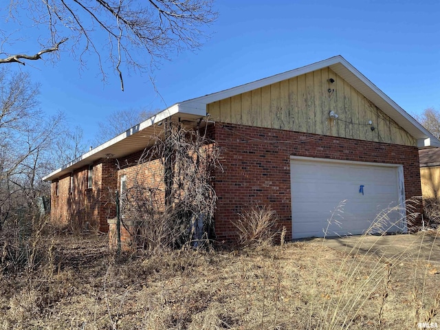 view of property exterior with a garage