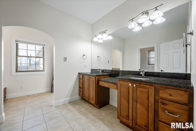 bathroom featuring vanity and tile patterned floors