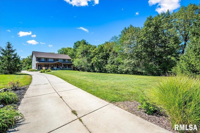 exterior space featuring a front lawn