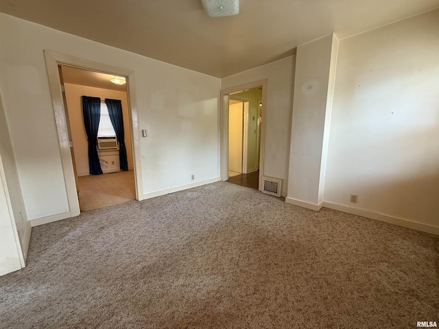 spare room with carpet