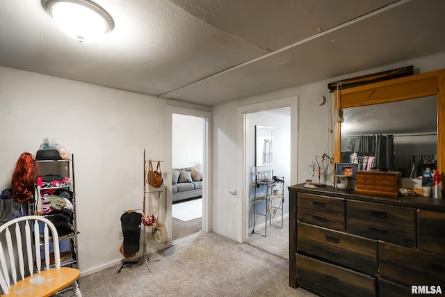 bedroom with light carpet