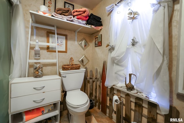 bathroom featuring toilet