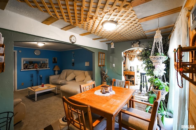 view of carpeted dining area