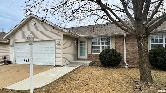 single story home with a garage