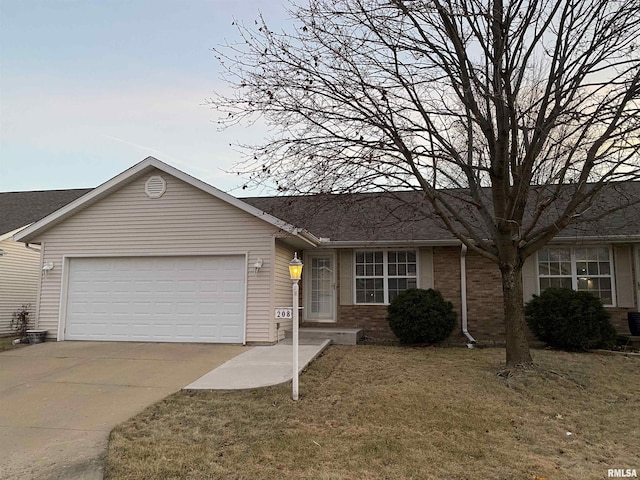 single story home with a garage and a front yard