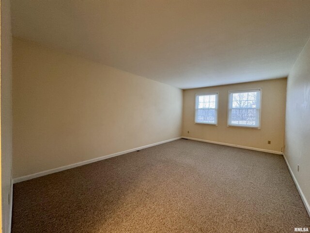 view of carpeted spare room