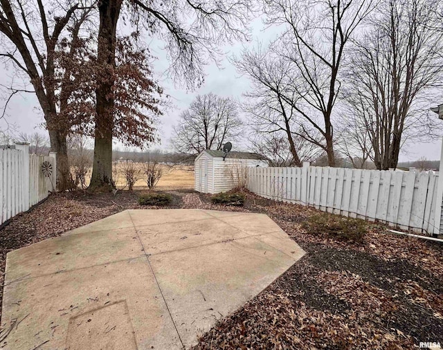 view of patio with a shed