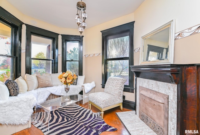 sitting room featuring hardwood / wood-style flooring