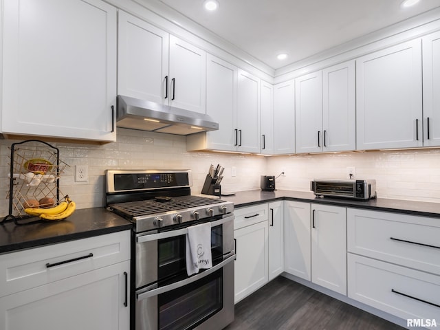 kitchen featuring white cabinetry, dark hardwood / wood-style flooring, and range with two ovens