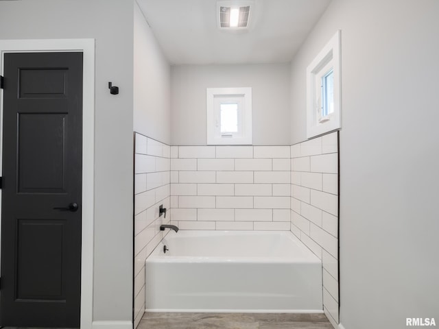 bathroom with a bath