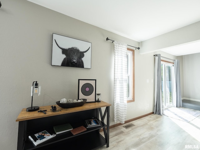 interior space with hardwood / wood-style flooring