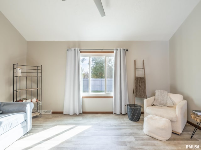 interior space with ceiling fan and light wood-type flooring