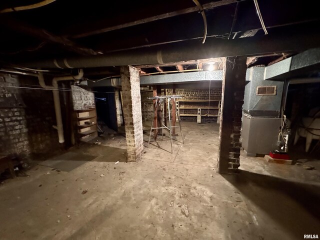 basement featuring heating unit