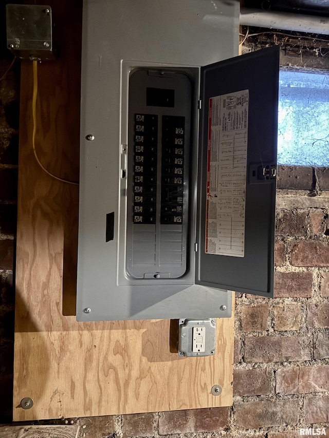 utility room featuring electric panel