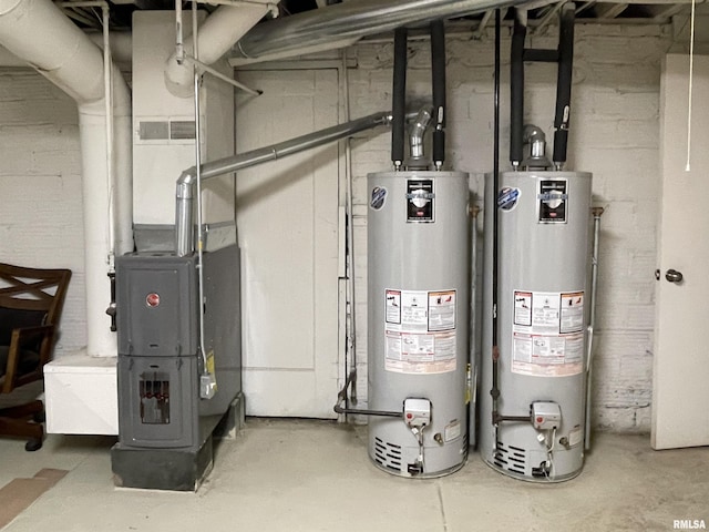 utility room with gas water heater