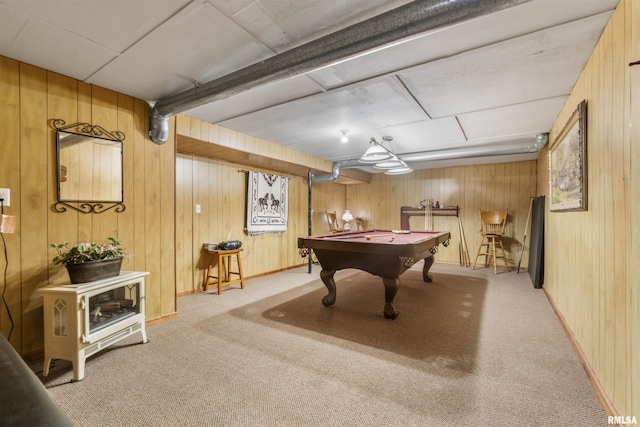 rec room featuring light colored carpet, wooden walls, and billiards