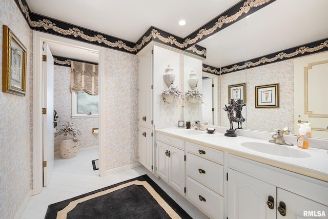 bathroom featuring tile patterned floors and vanity