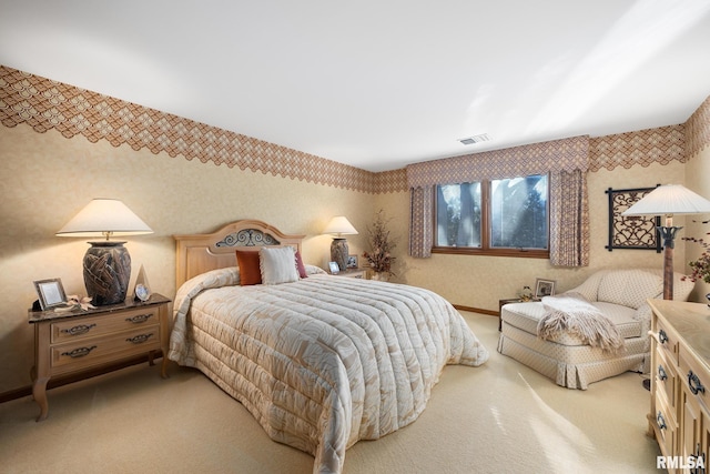 bedroom featuring light colored carpet