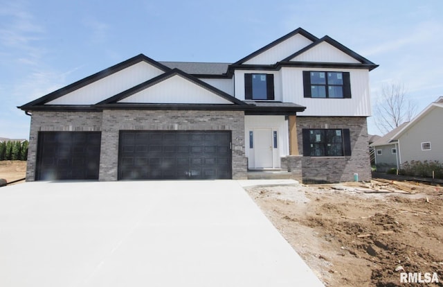 7023 N Water Oak Dr, Edwards, IL 61528 - view of front of home featuring brick siding, driveway, and an attached garage