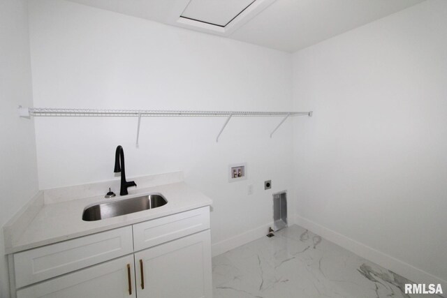 7023 N Water Oak Dr, Edwards, IL 61528 - washroom with cabinet space, washer hookup, electric dryer hookup, baseboards, and light marble finish flooring