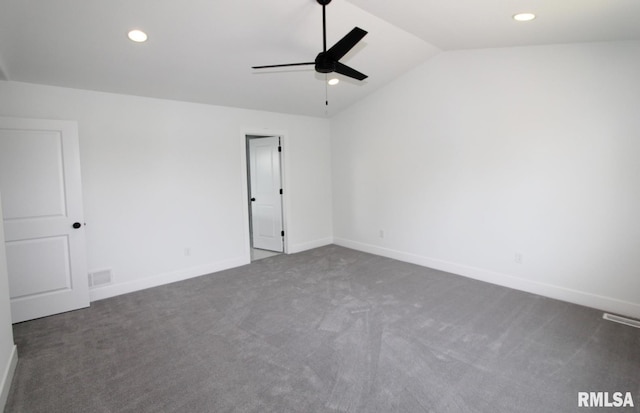 7023 N Water Oak Dr, Edwards, IL 61528 - empty room with dark carpet, ceiling fan, vaulted ceiling, recessed lighting, and baseboards