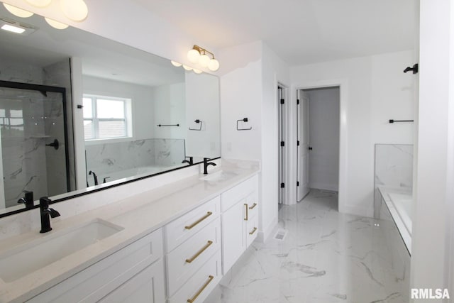 7023 N Water Oak Dr, Edwards, IL 61528 - full bathroom with marble finish flooring, double vanity, a bath, and a marble finish shower