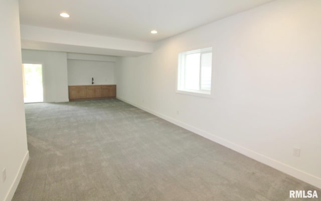 7023 N Water Oak Dr, Edwards, IL 61528 - spare room featuring light carpet, baseboards, and recessed lighting
