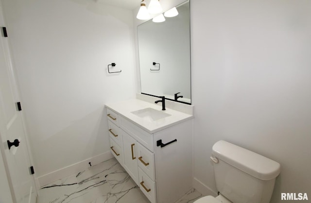 7023 N Water Oak Dr, Edwards, IL 61528 - half bathroom featuring vanity, toilet, baseboards, and marble look tile flooring